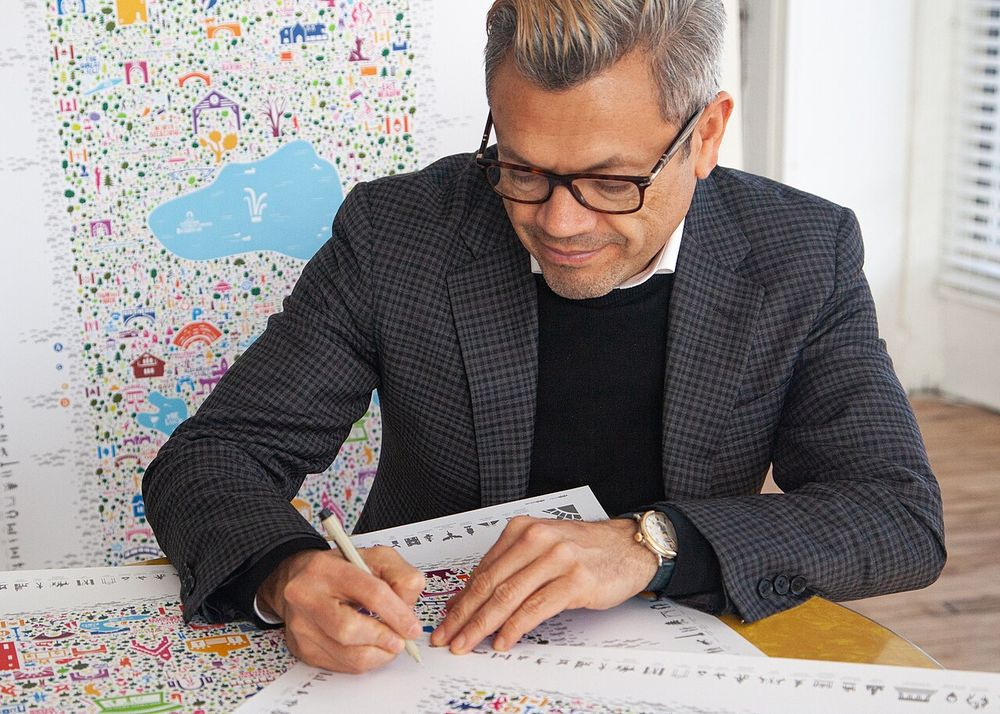 Rafael Esquer at Alfalfa Studio in New York City, reviewing an Iconic Cities poster, 2021.